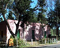 Frente rodeado de arboles de Museo Regional Lolma